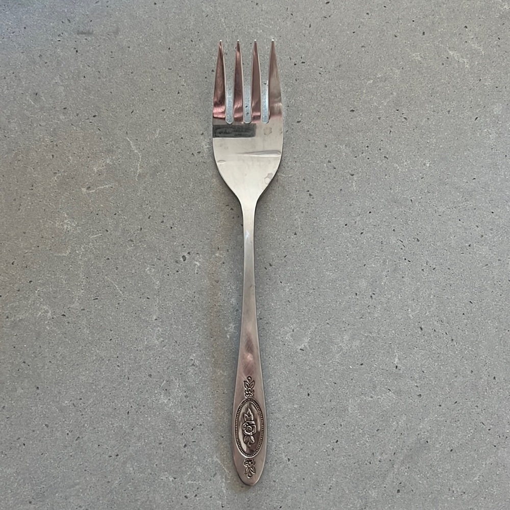Oneida deluxe stainless. Cold meat fork